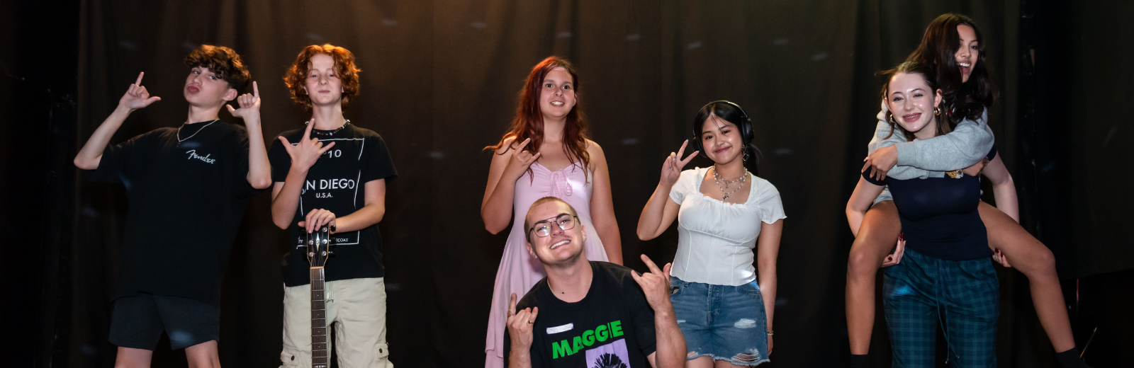 Participants of the Teen Creators Lab make faces at the camera together