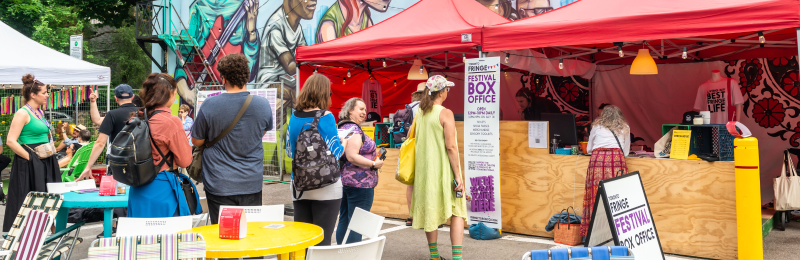 Patrons line up to be served at the Festival Box Office